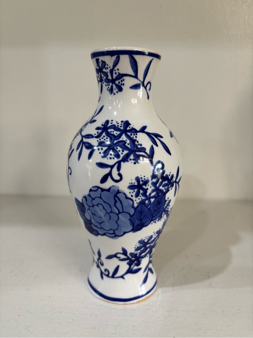 Vintage porcelain blue and white bud vase